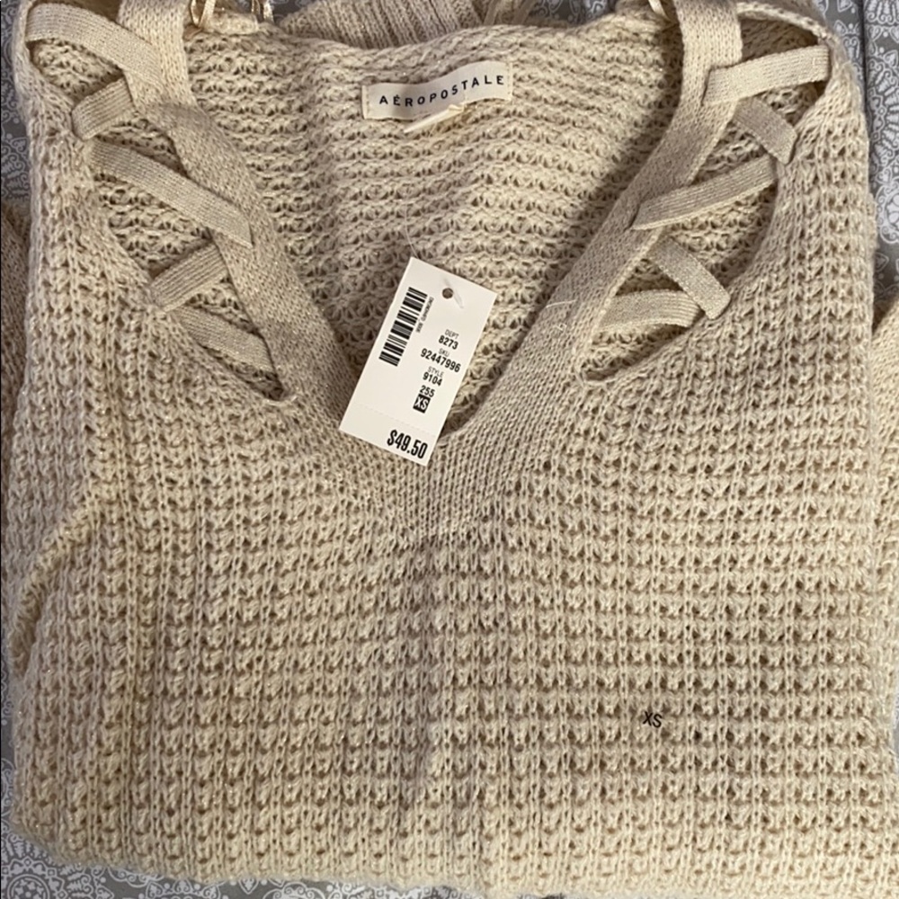 tan sweater